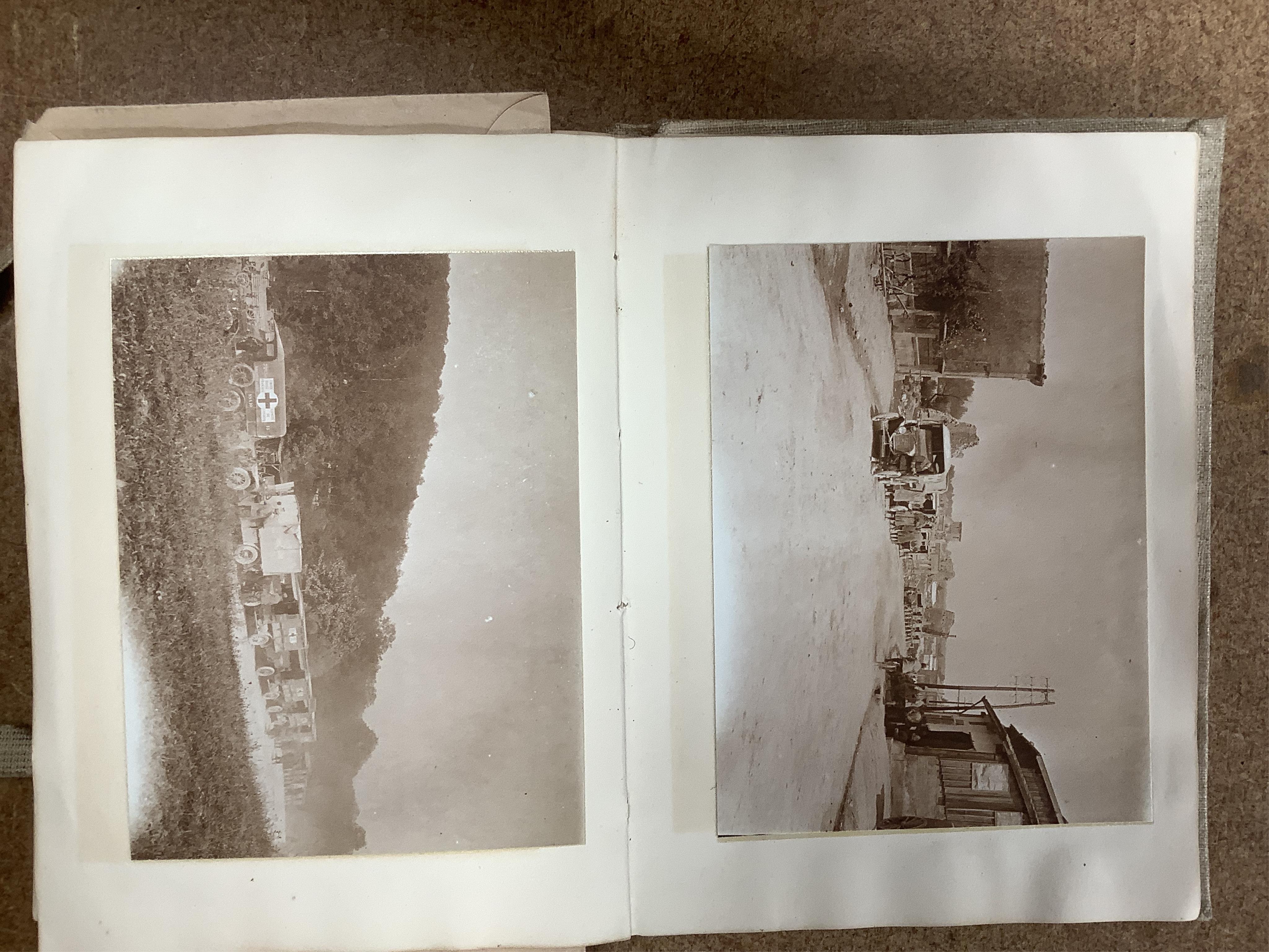 A WWI Ambulance and Balloon Brigade photograph album, pocket watch, coin, etc. Condition - fair, pocket watch ticks when wound